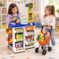Niñas jugando con el supermercado de juguete